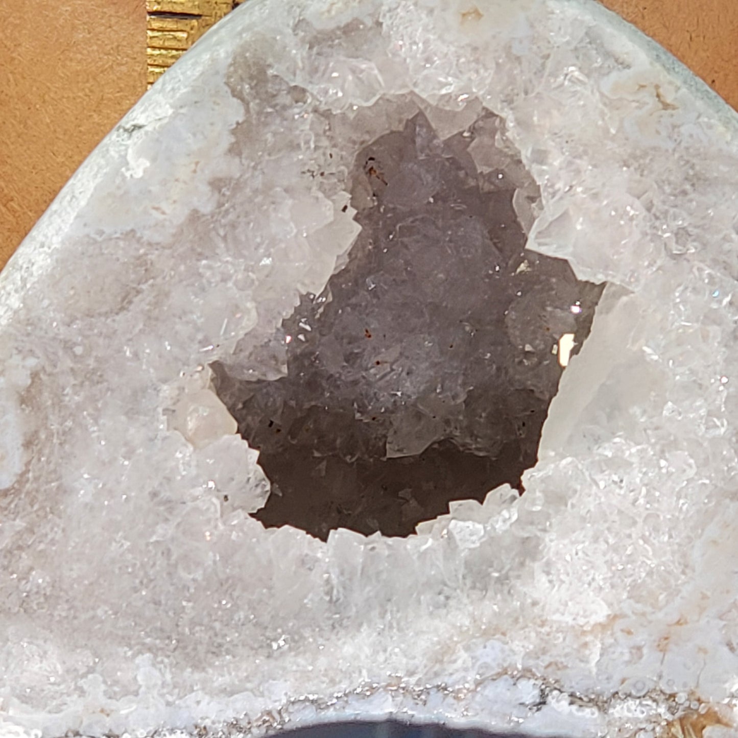 Polished double geode with UV reactive brown calcite
