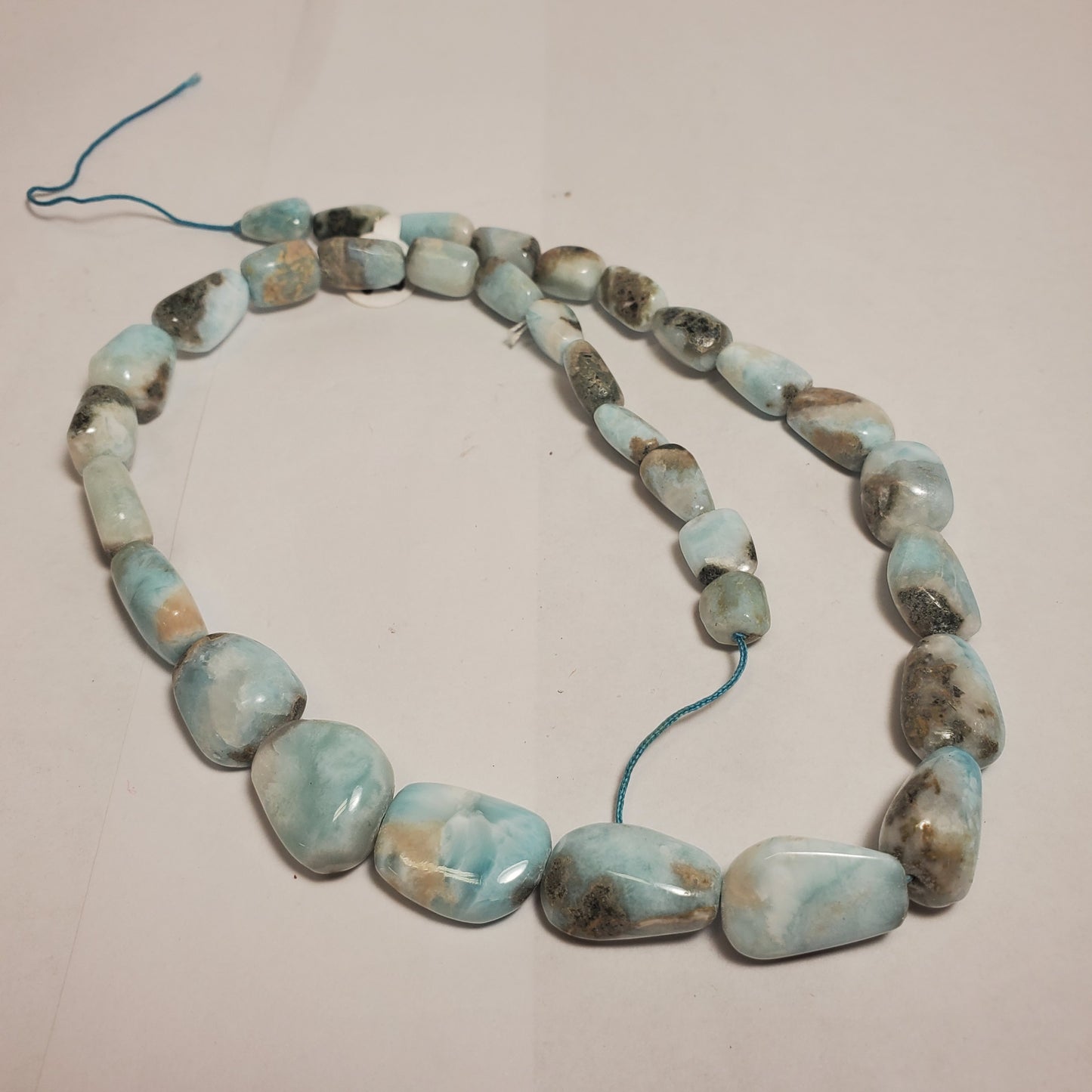STRAND OF LARIMAR STONES