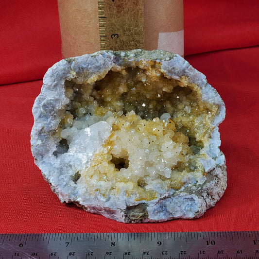 "Golden Quartz" geode with cleaved calcite and coated barite