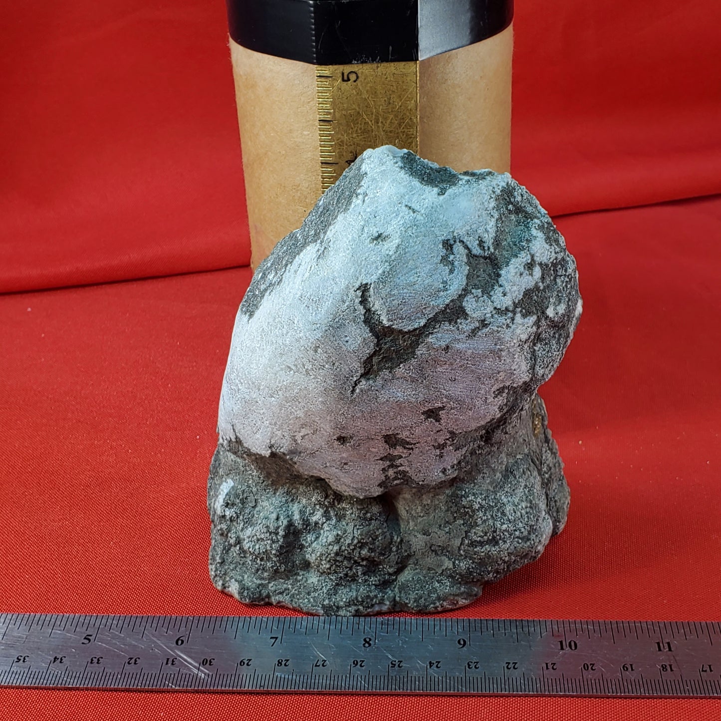 Cracked double geode, cut to stand, with pyrite on the outside