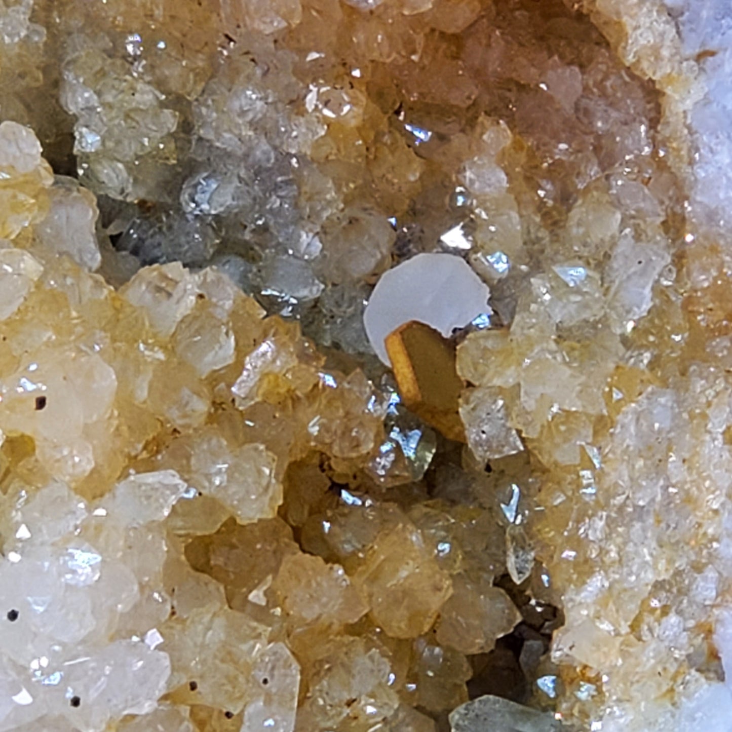"Golden Quartz" geode with cleaved calcite and coated barite