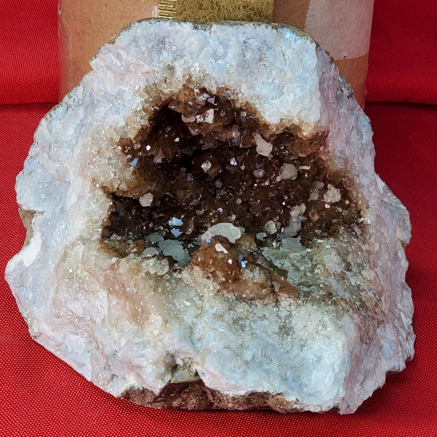 UV reactive iridescent brown calcite geode piece