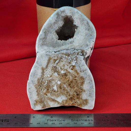 Polished double geode with UV reactive brown calcite