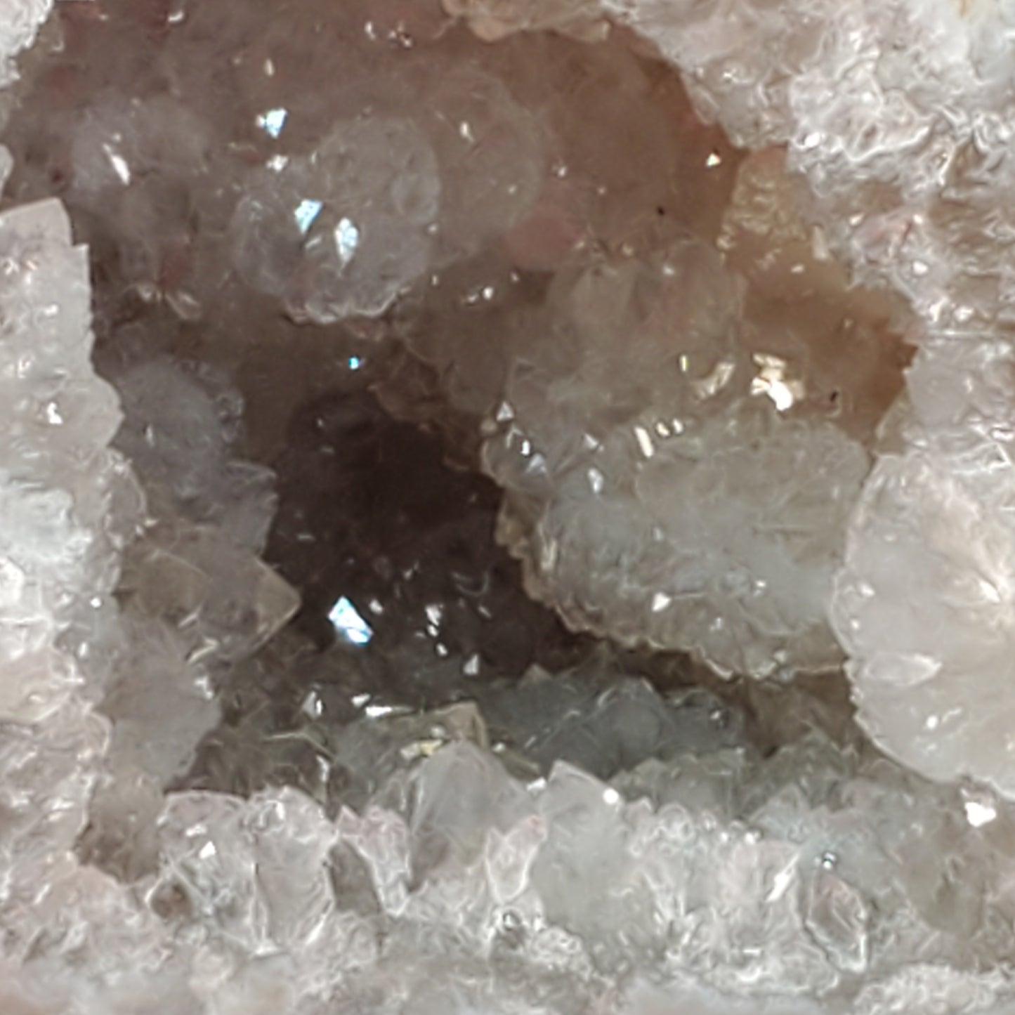 Cracked double geode, cut to stand, with pyrite on the outside