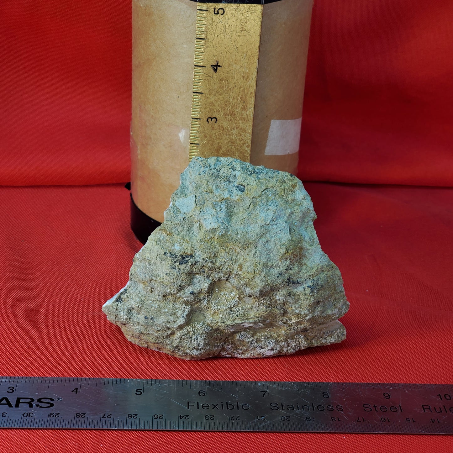 UV reactive iridescent brown calcite geode piece
