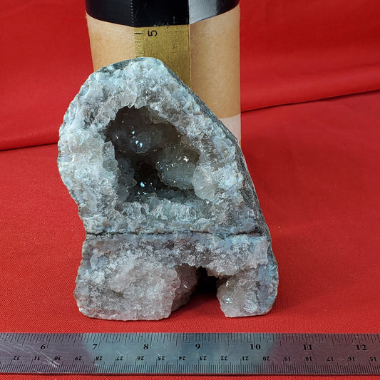 Cracked double geode, cut to stand, with pyrite on the outside