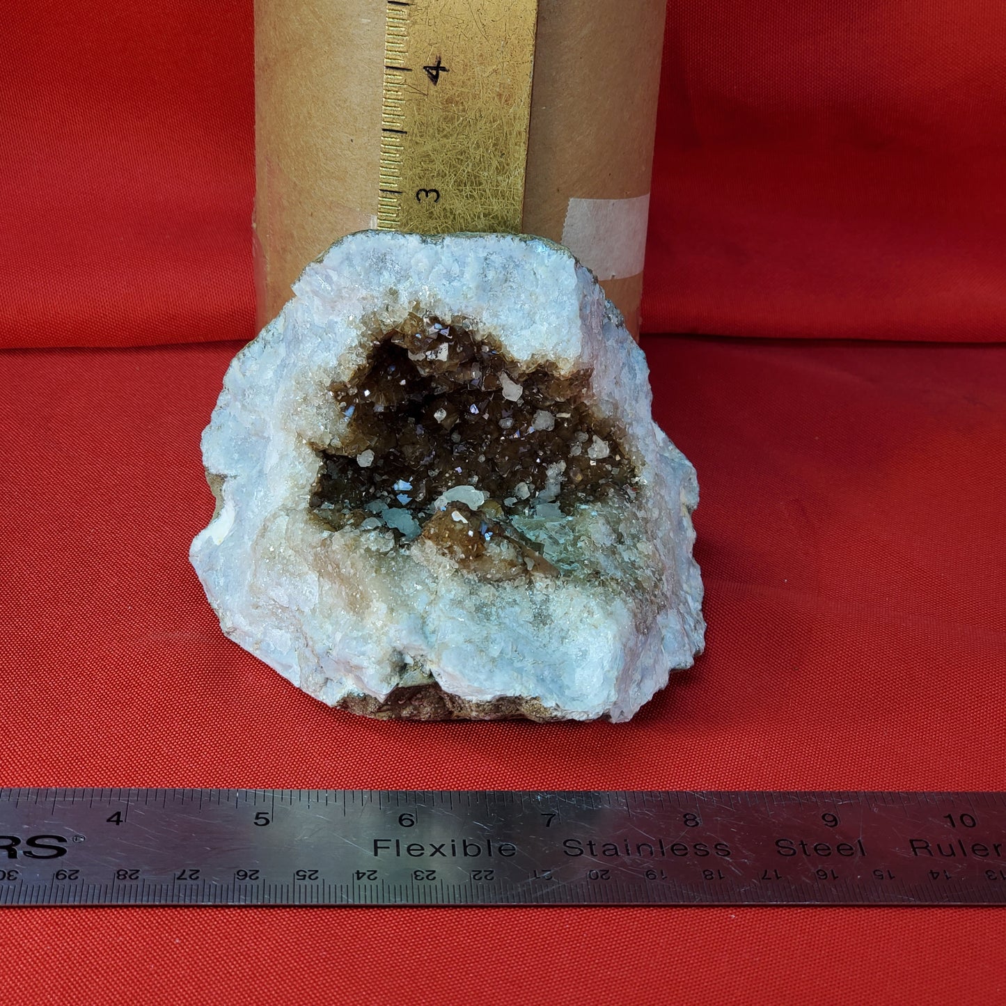 UV reactive iridescent brown calcite geode piece