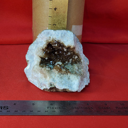 UV reactive iridescent brown calcite geode piece